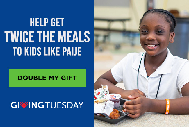 Paije smiling and sitting at a school cafeteria table with a food tray in front of her. A headline reads: Help get twice the meals to kids like Paije. A button reads: Double my gift. Below is the Giving Tuesday logo.