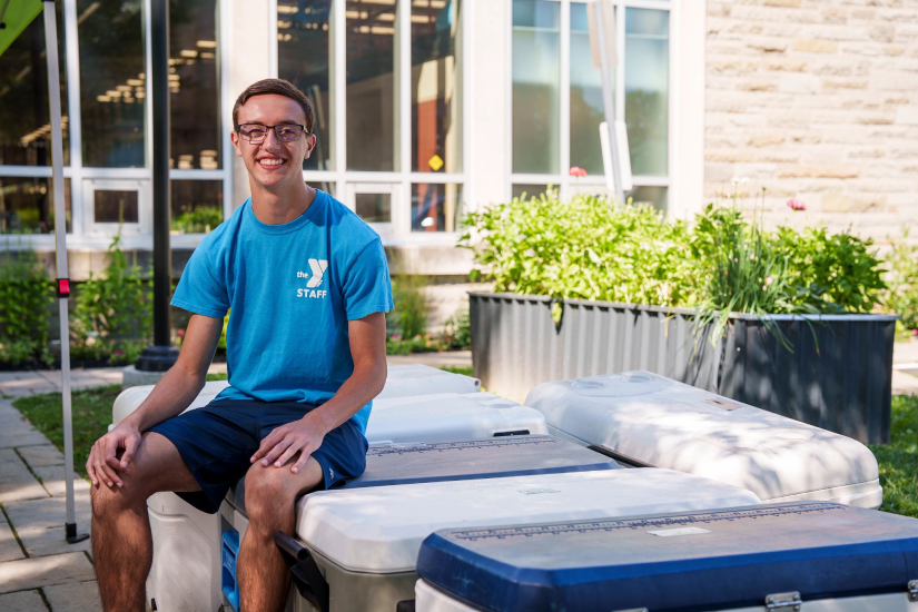 Teacher Sitting On Cooler